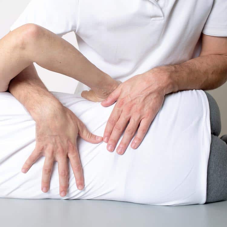 Gunderman-chiropractic-back-adjustment Chiropractor adjusting patient's back why choose us